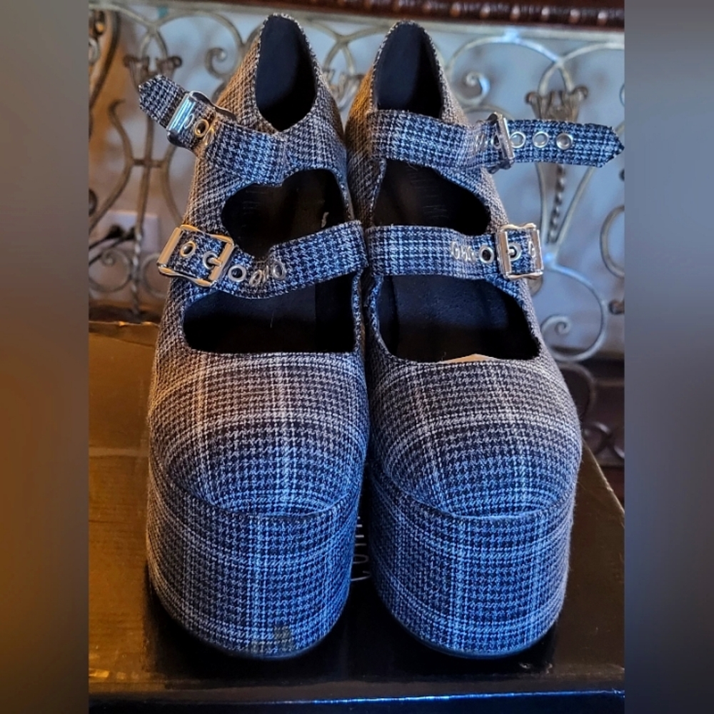 Size 9 grey and black checker platform heels.
